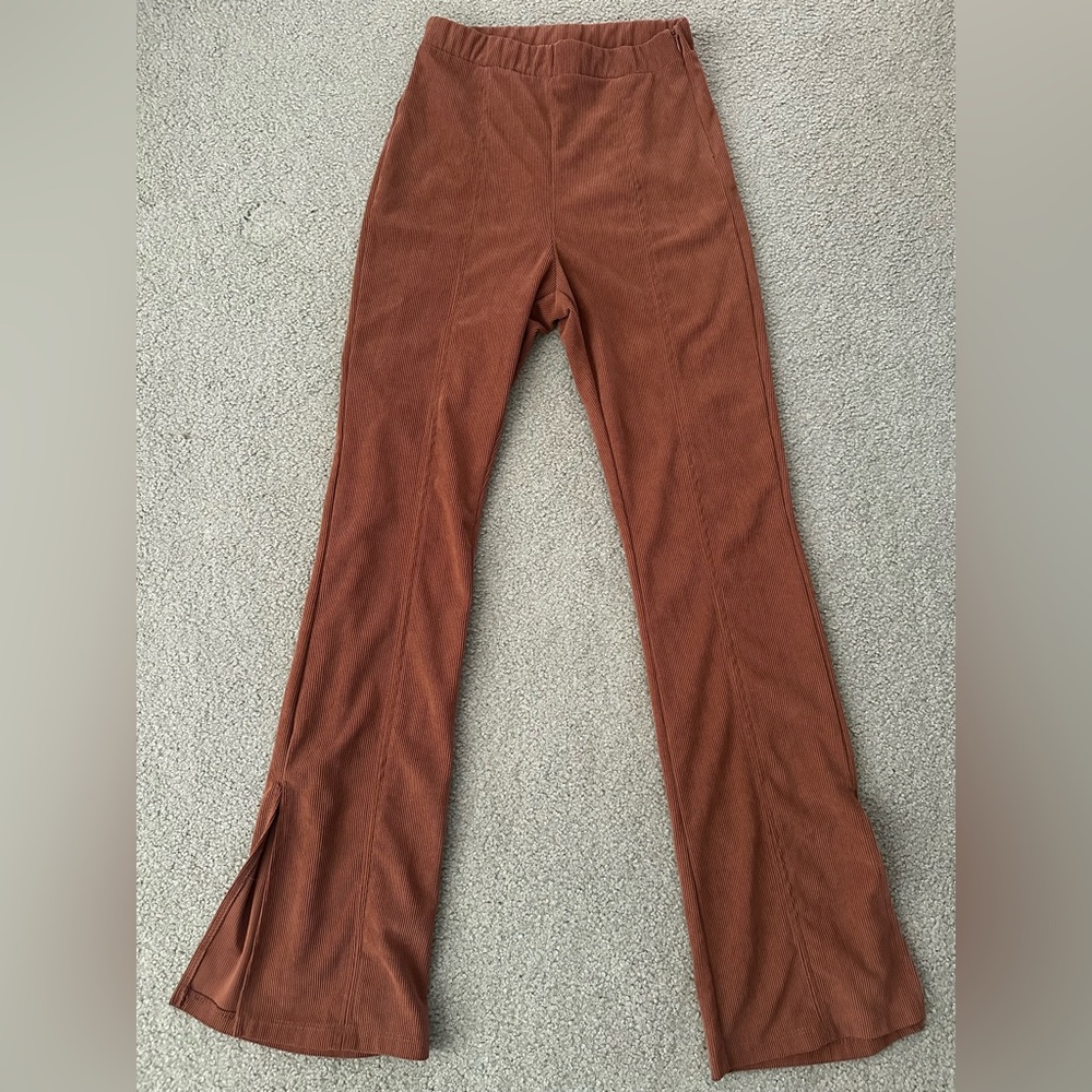 Kirious brown corduroy ribbed flare pants with slits at bottom, size XS